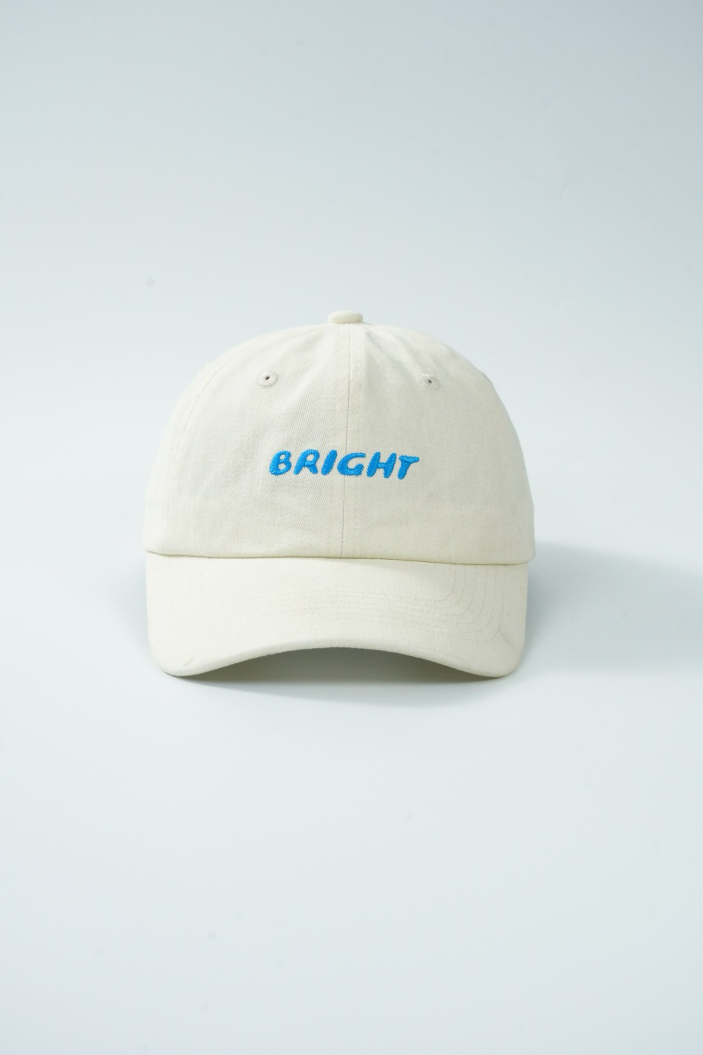 Bright Cap (Washed Off White With Blue Logo)